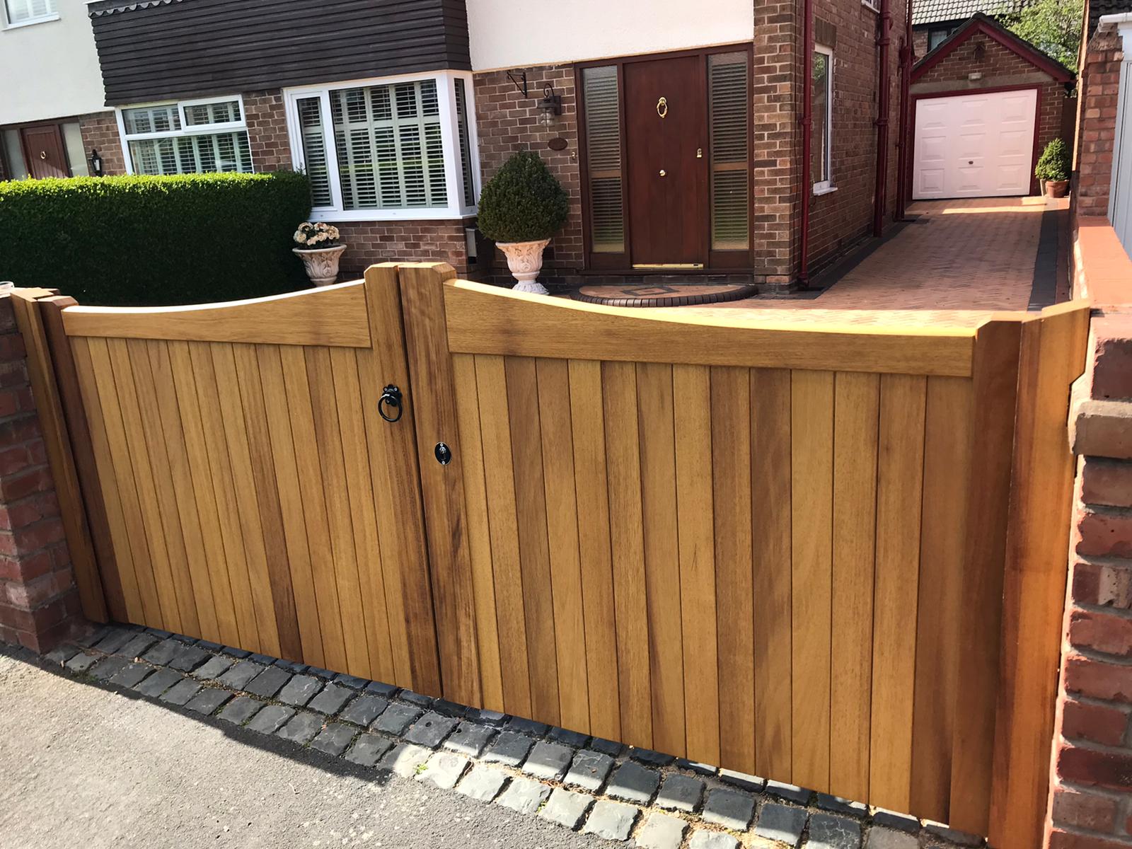 An Idbigo hardwood mid-oak double gate in a Stockton design