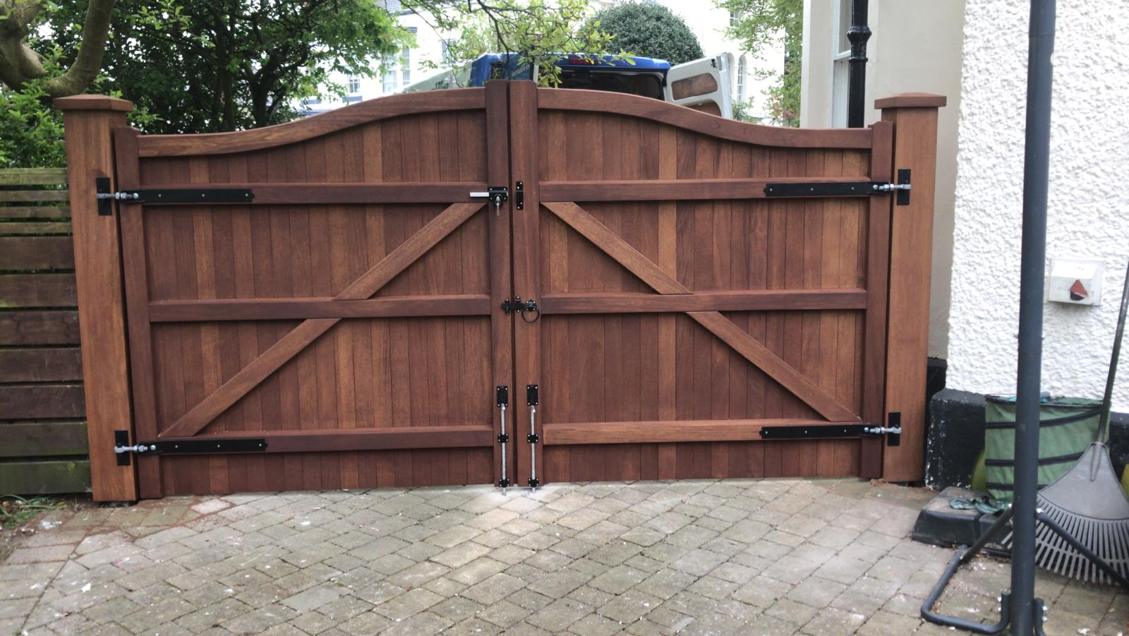 The back of an Iroko hardwood double gate with a Swan Neck design