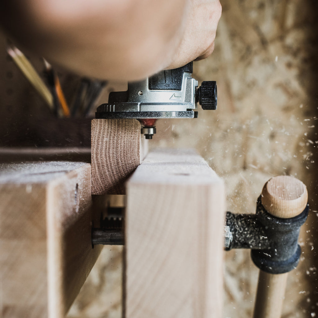 A wooden gate being manufactured