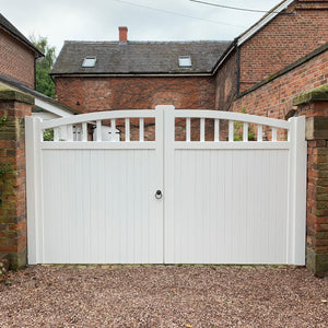 The white hardwood driveway gate