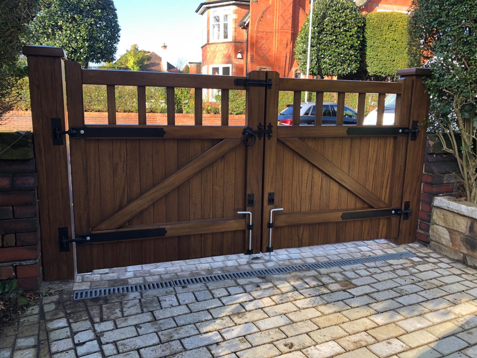 The back of a dark oak hardwood double gate in a Cheshire design