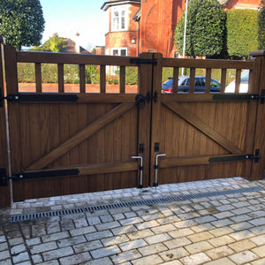 The back of a dark oak hardwood double gate in a Cheshire design