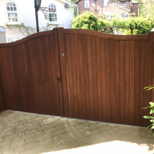 An Iroko hardwood double gate with a Swan Neck design